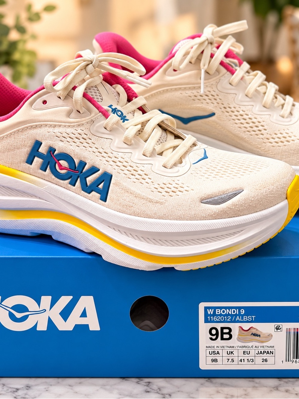 Hoka Bondi 9 Women’s Running Shoes — Cream with Pink & Yellow Accents